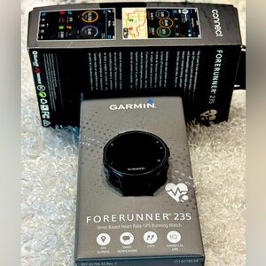 044 Garmin Forerunner 235, GPS Running Watch, Black/Gray in great condition!